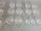 a lot of empty wine glasses sitting on a table