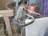 a picture of a drill and a sander in a room
