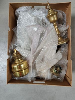 a box with some items inside of it on the floor