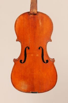 an old violin on a white background