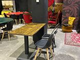 a room with a table and chairs in it