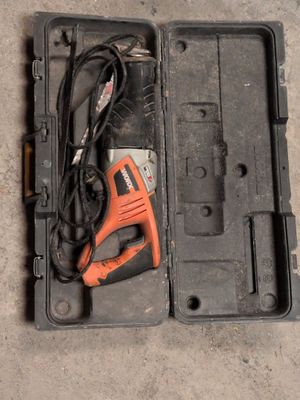 a tool in the case that is sitting on the floor