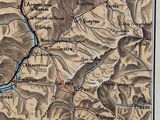 an old map of a mountain area with a river running through it