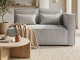 an image of a living room with a couch and a coffee table