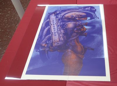 a picture of a picture of a space ship on a red table