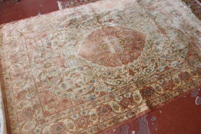a large rug on the floor in a room