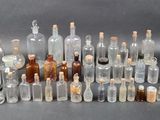 a lot of bottles that are sitting on a table