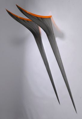 two forks that have been cut in half to look like a fork