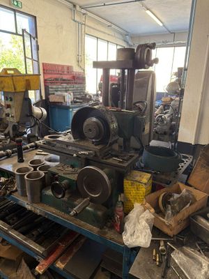 a room filled with machines and tools in a building