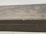 an old suitcase that is sitting on a table