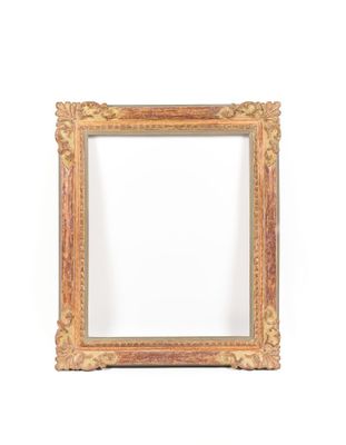 an old picture frame on a white wall with a white background