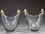pair of clear glass candle holders with gold candlesticks