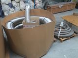 a cardboard box that has a pipe inside of it