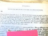 a piece of paper on top of an open book