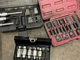 a lot of tools that are laying out on the floor