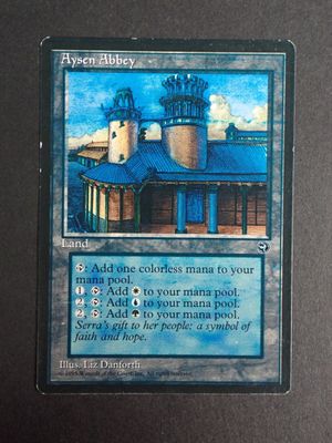 a close up of a card with a picture of a building