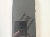 someone taking a picture of themselves in a mirror with their cell phone