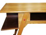 a wooden desk with a drawer underneath it