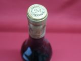 a bottle of wine that is sitting on a table