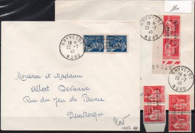 envelope with a picture of a clock on the front and a postcard on the back of the envelope