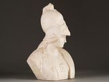 marble bust of a man with a helmet on his head
