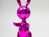 purple rabbit sculpture on white background