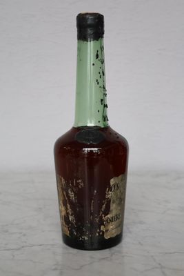 a bottle of liquor that is sitting on a table