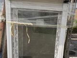 a picture of a window that is sitting on top of a pallet