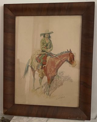 tableau représentant un cow-boy à cheval, dans un cadre en bois