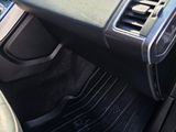 a close up of a car ' s dashboard with a steering wheel