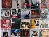 a lot of movies on the wall in this room