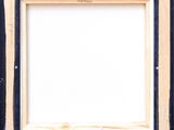an old picture frame with a black border and a white background