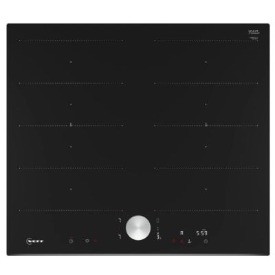 a close up of a black stove top with buttons and knobs