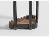 a close up of a metal shelf with a wooden tray on it
