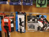 a display of cell phones on the wall in a store