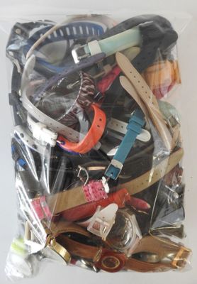 a bag full of assorted items on a table
