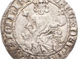 gros plan d'une pièce de monnaie en argent sur fond blanc