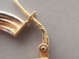 a close up of a pair of scissors on a table