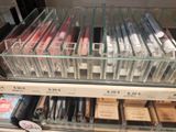 a lot of lipstick on display in a store