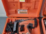 two tools in the orange case on the floor