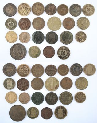 an image of a pile of old coins sitting on top of a white surface