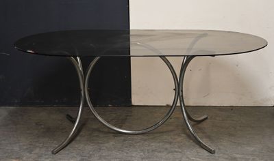 a black table with a glass top in a room