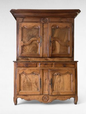 BUFFET à deux corps en chêne et noyer mouluré et sculpté à c…