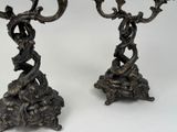 pair of antique bronze candlesticks with birds and flowers on them