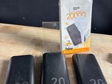 three batteries sitting next to each other on a table