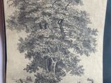 a black and white drawing of a tree on a wall