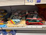 a lot of books on a shelf in a store