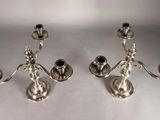pair of silver plated candlesticks with black stones