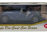 model of a blue car in a box on a white background