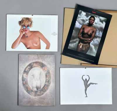 a lot of cards and a picture of a woman on the wall